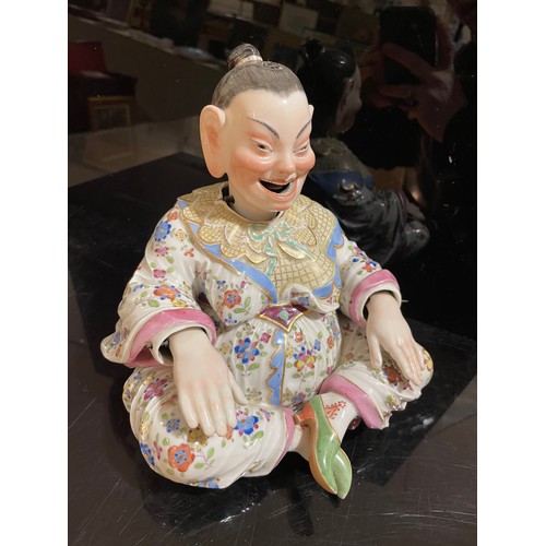 1013 - A Meissen porcelain nodding Pagoda figure, 19th century, seated form with wagging tongue and articul... 