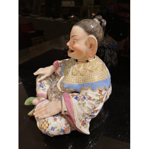 1013 - A Meissen porcelain nodding Pagoda figure, 19th century, seated form with wagging tongue and articul... 