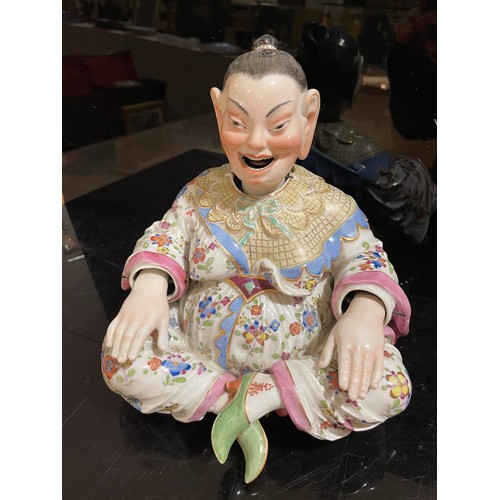 1013 - A Meissen porcelain nodding Pagoda figure, 19th century, seated form with wagging tongue and articul... 