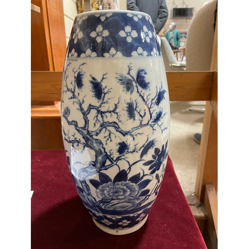 1250 - A Chinese blue and white porcelain vase of bulbous form, hand painted flowers, height 37cm