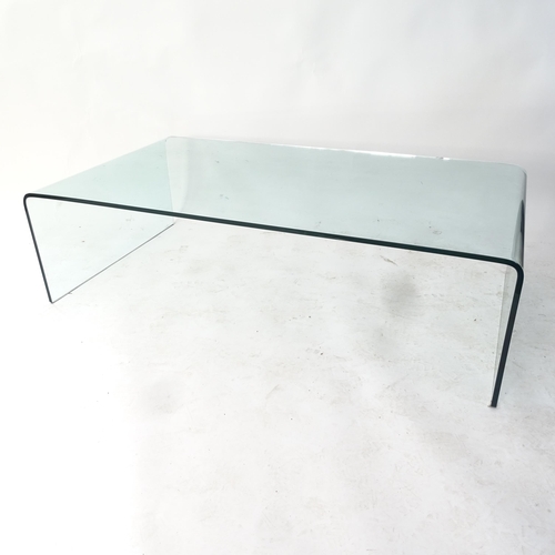 2024 - A contemporary design glass rectangular coffee table, W130cm, H36cm, D69cm