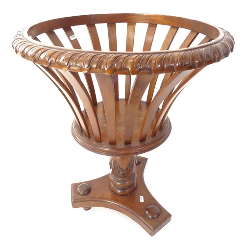 2028 - A reproduction Empire style jardiniere on platform base, H65cm