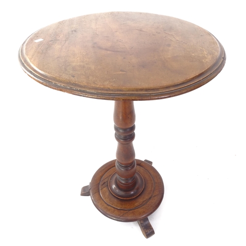 2033 - A 19th century mahogany circular lamp table, on turned column with platform base, W55cm, H72cm