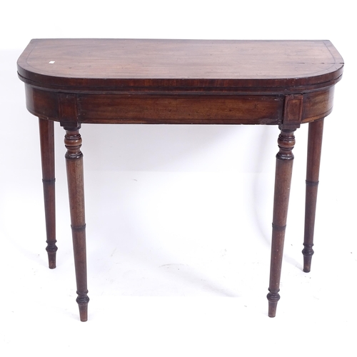 2038 - A 19th century mahogany ebony-strung fold over card table, W91cm, H76cm, D45cm