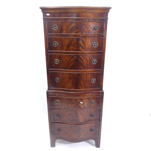 2040 - A reproduction mahogany serpentine-front chest on chest, W63cm, H159cm, D42cm