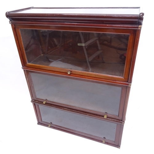 2052 - An early 20th century mahogany 3-section Globe-Wernicke bookcase, lacking base, W87cm, H112cm, D30cm