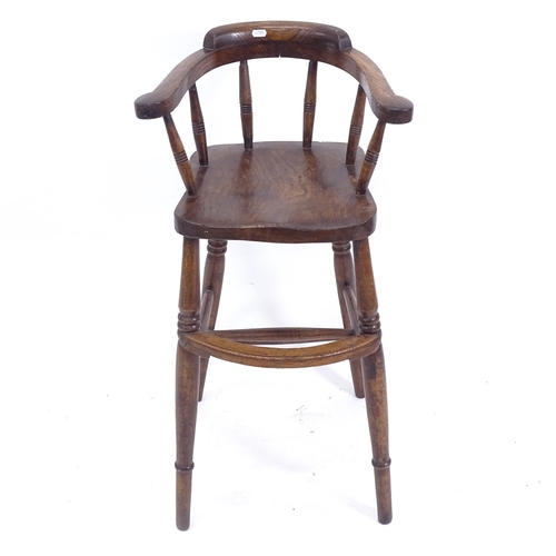 2062 - An Antique elm-seated bow-back chair stool