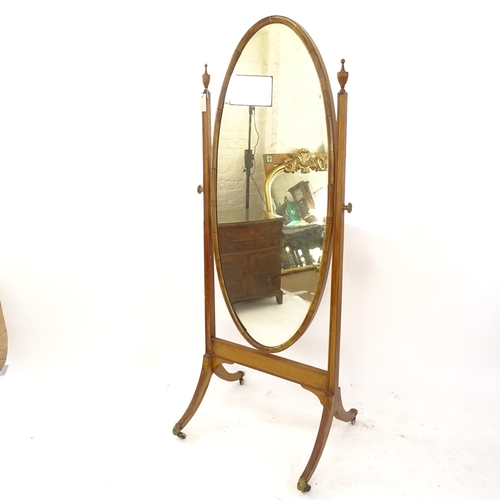 2075 - A 19th century walnut-framed cheval mirror, W64cm, H175cm