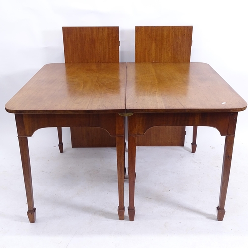 2085 - A 19th century mahogany round-cornered extending dining table, raised on 6 square tapered legs with ... 