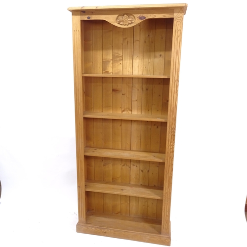 2089 - A modern polished pine open bookcase, W90cm, H200cm, D26cm