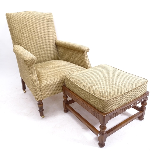 2098 - A modern upholstered Ercol armchair and matching foot stool