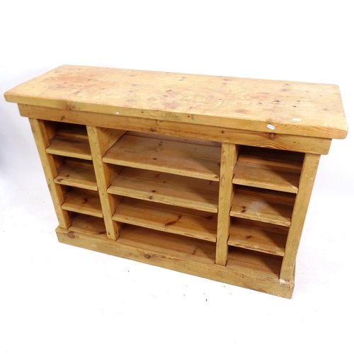 2107 - A pine kitchen dresser base with open shelves, L137cm, H90cm, D47cm