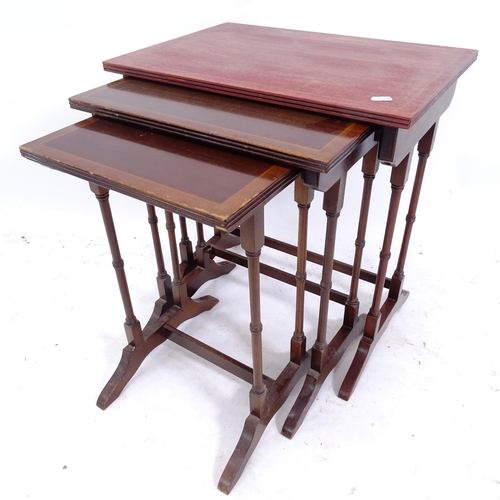 2116 - A reproduction mahogany nest of 3 occasional tables, widest 51cm