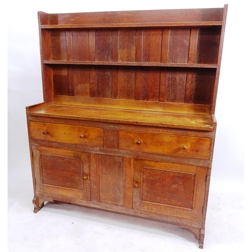 2122 - A Heals Cotswold School Arts and Crafts oak dresser, by Greening of Oxford, circa 1930, W132cm, H156... 