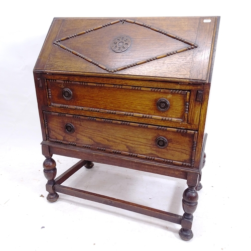 2125 - A 1940s oak 2-drawer bureau, W73cm, H90cm, D39cm