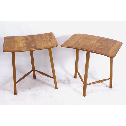 2147 - A pair of mid-century Ercol elm dining table ends, on beech legs, W70cm, H74cm, D46cm