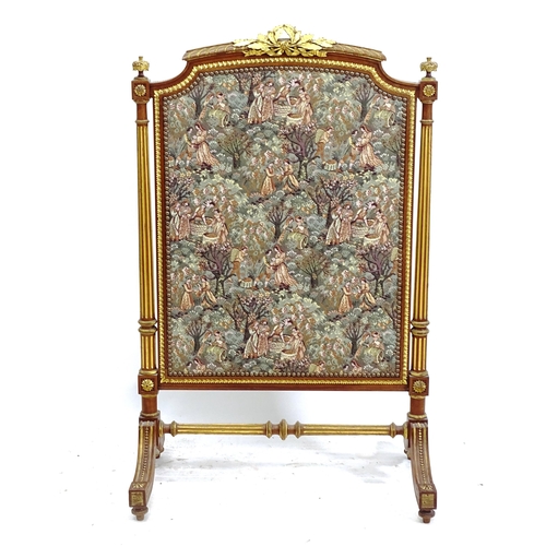 2160 - A Continental stained beech and gilded fire screen, with inset tapestry panel, W66cm, H105cm