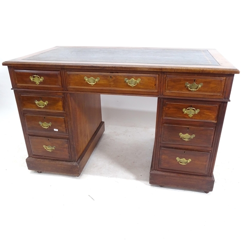 2170 - A Victorian mahogany twin-pedestal writing desk, with green tooled leather skiver and fitted drawers... 