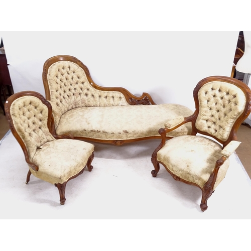 2184 - A Victorian carved mahogany-framed and upholstered chaise, together with a matching open armchair an... 