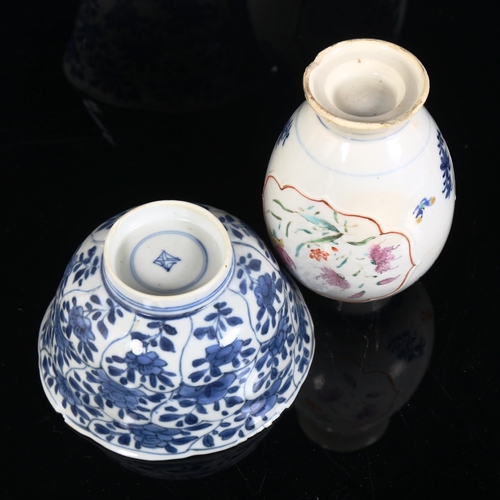 100 - A Chinese export porcelain baluster vase, and a small blue and white lotus bowl, diameter 11.5cm (2)