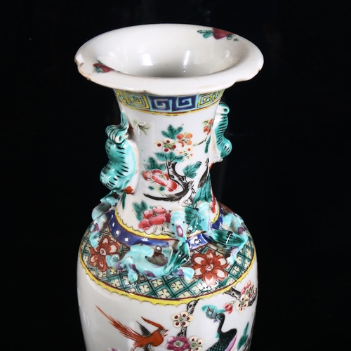 107 - A Chinese famille verte porcelain 'Phoenix' baluster vase, with applied dragon and Dog of Fo decorat... 