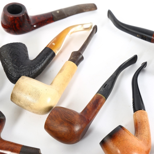 113 - A collection of smoking pipes, including shell, amber-root, Magic Inch etc (11)