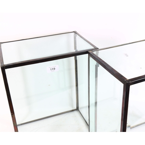 119 - 2 metal-clad bevel-edge glass cases, W31cm, H41cm, D21cm