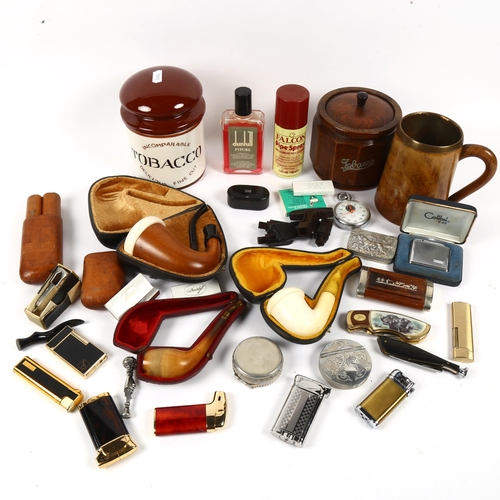 130 - Various smoking paraphernalia, including cased pipes, oak tobacco jar, Presta stopwatch, lighters et... 