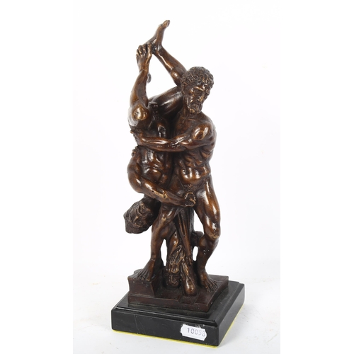 71 - A patinated plaster figural sculpture, Gladiators in combat, unsigned, height 30cm