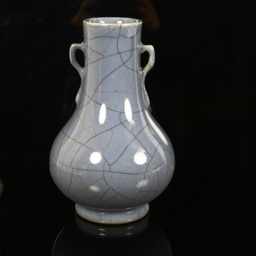 90 - A Chinese blue crackle glaze pottery vase, Hu, height 21cm