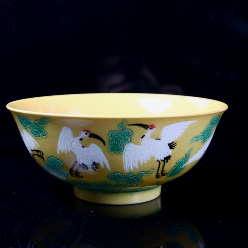 92 - A Chinese yellow ground porcelain 'Crane' bowl, 6 character mark on base, diameter 15cm