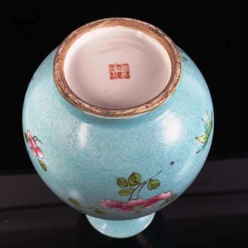 95 - A Chinese blue ground gourd vase, floral decoration with 6 character mark on base, height 29cm (rim ... 