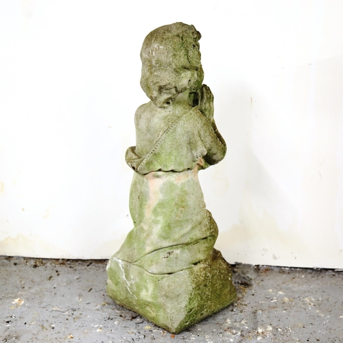 4 - A weathered concrete praying child garden ornament, height 67cm