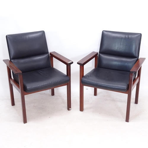 2130 - A pair of mid-century Danish design rosewood stained and black leather armchairs