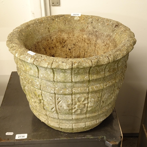 2670 - A weathered concrete garden pot, diameter 41cm, height 32cm