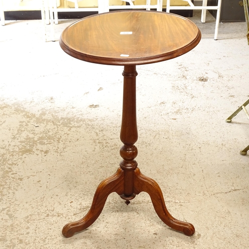 2695 - A mahogany wine table on tripod base (A/F), height 75cm