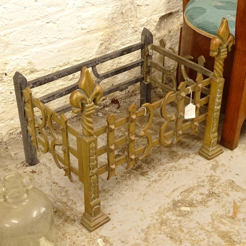 2704 - An Arts and Crafts design brass and cast-iron fireplace (missing grate), W54cm, H43cm, D34cm