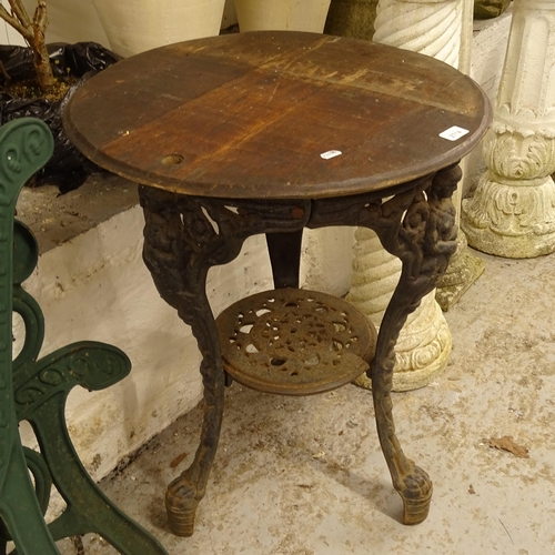 2714 - An embossed cast-iron circular pub table, W57cm, H72cm