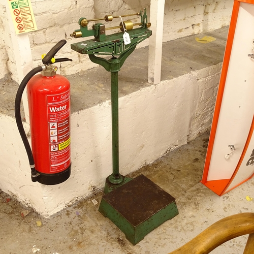 2727 - A Vintage green painted stand-on weighing scales