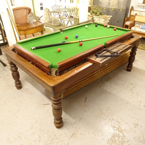 2673 - An early 20th century quarter-size snooker dining table, with rollover slate-bed, complete with cues... 
