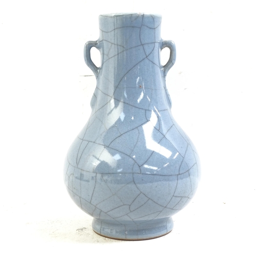 90 - A Chinese blue crackle glaze pottery vase, Hu, height 21cm