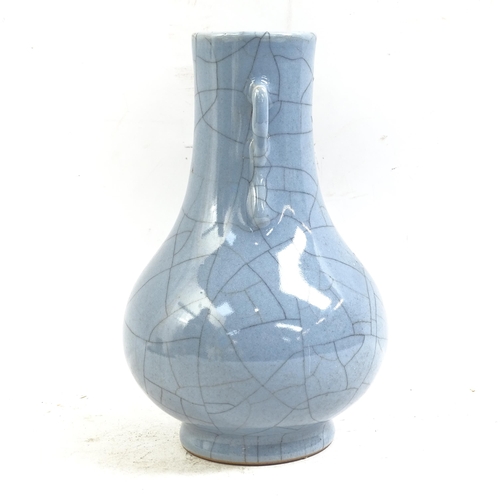 90 - A Chinese blue crackle glaze pottery vase, Hu, height 21cm