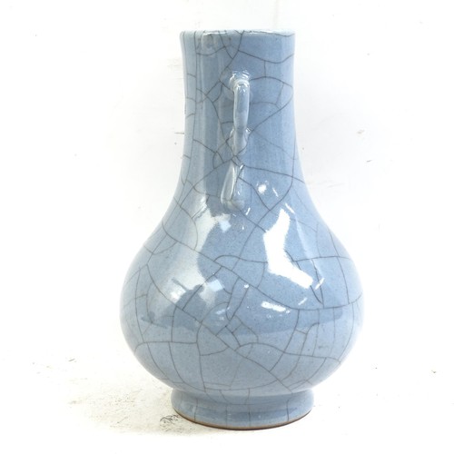 90 - A Chinese blue crackle glaze pottery vase, Hu, height 21cm