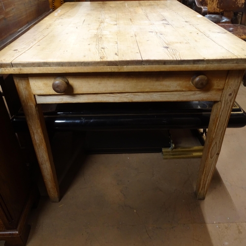 2006 - An Antique pine scrub-top kitchen table with end frieze drawer, W137cm, H75cm, D87cm