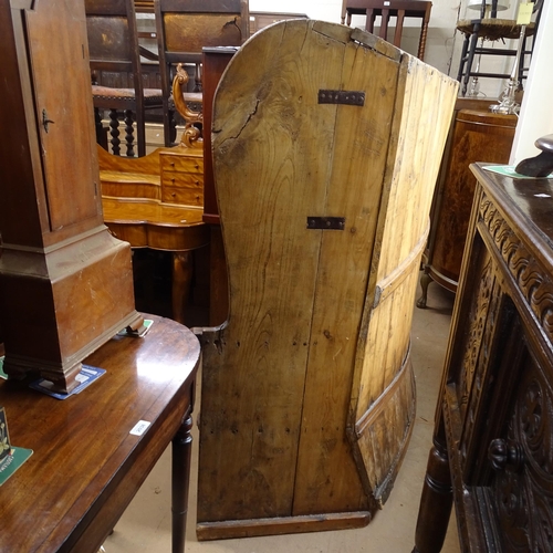 2022 - A large Antique stained pine bow-back settle, H140cm, L165cm