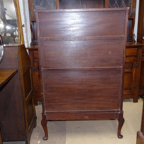 2092 - An Edwardian mahogany bureau, with shaped raised shelf, 3 long drawers and open shelf below, on cabr... 