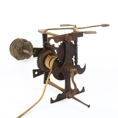 1 - An 18th century wrought-iron country house spit roasting engine jack, with weight driven movement an... 