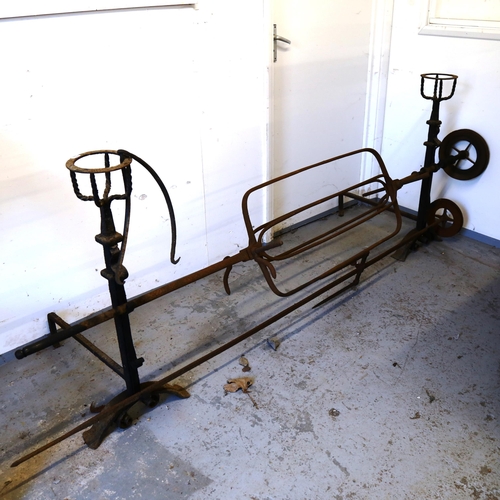 1 - An 18th century wrought-iron country house spit roasting engine jack, with weight driven movement an... 