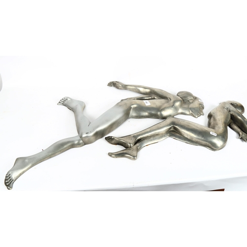 142 - 2 silvered fibreglass Art Deco style wall-mounted dancer sculptures, largest height 88cm