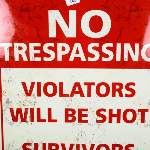 144 - A modern lithographed tin No Trespassing sign, 70cm x 50cm